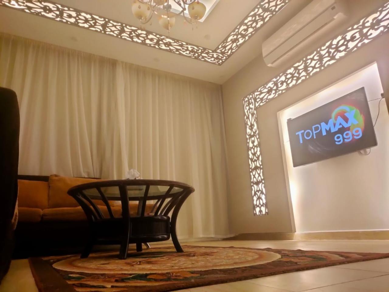 شالية غرفتين و رسيبشن و حمامين قرية بولمار بعد بورتو السخنه طريق الزعفرانه Apartment